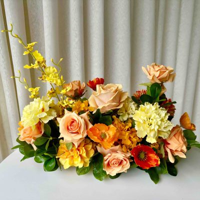 Elongated Low Faux Floral Centrepiece
