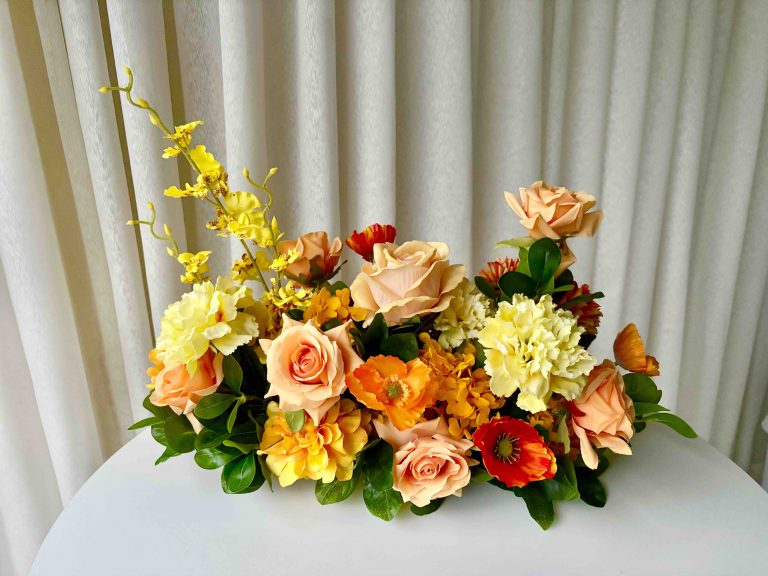 Elongated Low Faux Floral Centrepiece