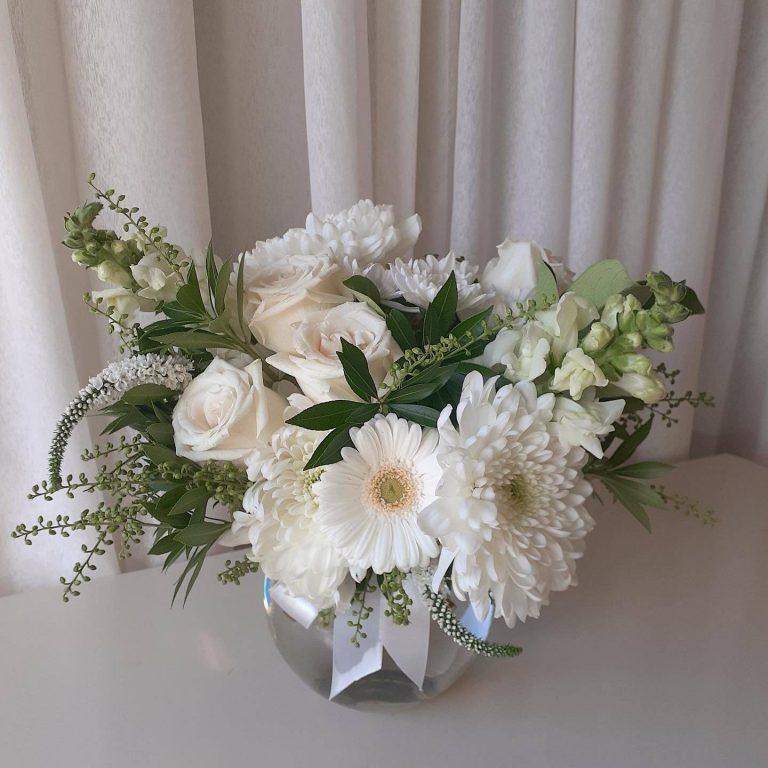 Small fishbowl floral arrangement