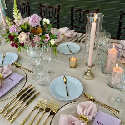 Gold Candlestick holder with candle and glass sleeve