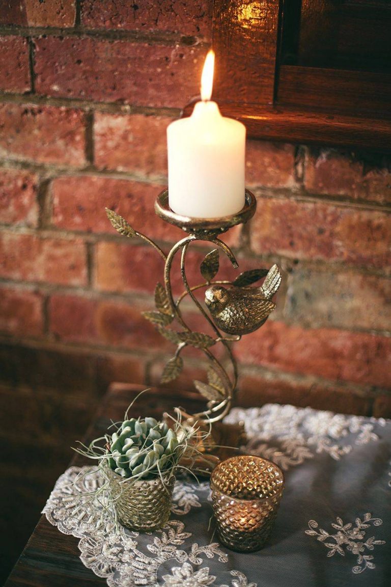 goldcandleholderwithbirdmotif